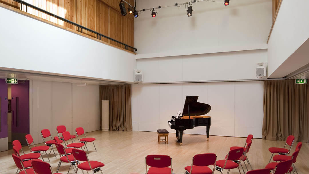 A grand piano inside the Attenborough Arts centre